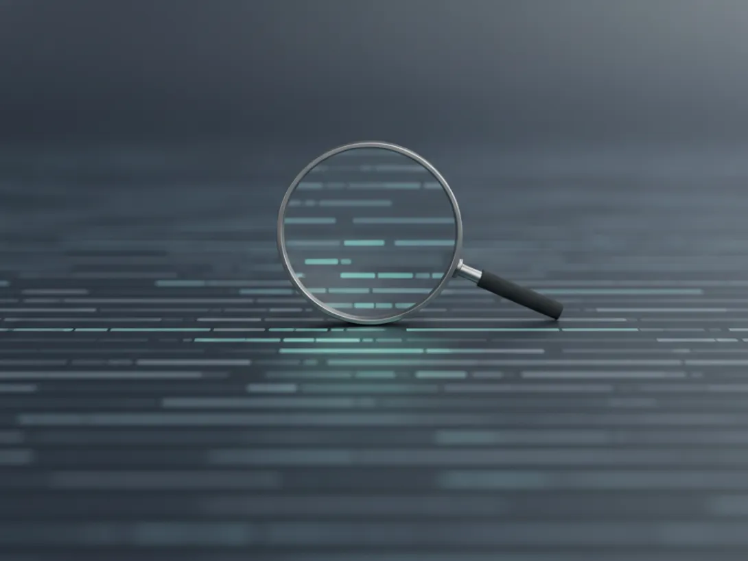 A magnifying glass held over lines of code on a dark screen, suggesting close review of software